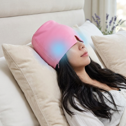 Woman resting with Duviro migraine relief cap in pink